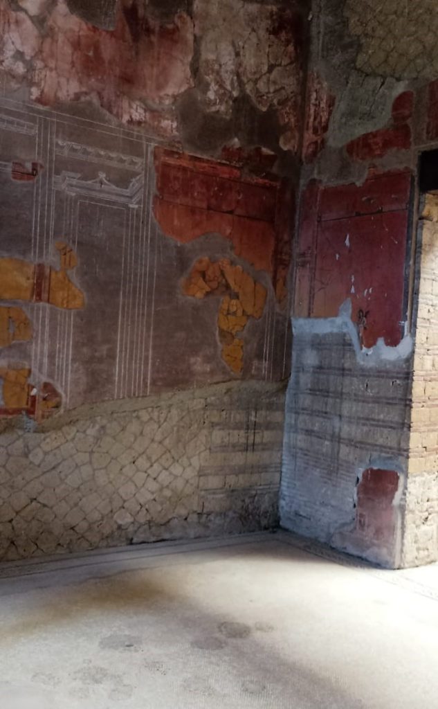 the frescoes in the beautiful courtyard house